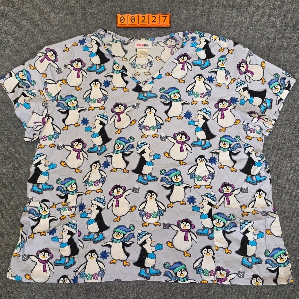 Scrubs Star penguin scrub top with penguins wearing hats and scarves Size 3XL.